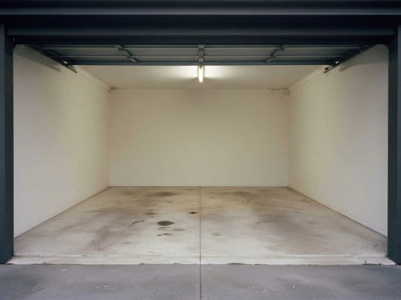 The same Pawtucket garage swept clear and organized after the junk removal crew finished